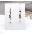 Boucles d'oreilles artisanale filigranée ronde nacrée