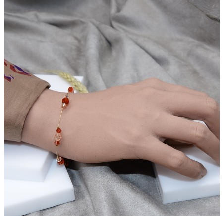 Bracelet artisanal doré Rouge Indien et Pêche Clair